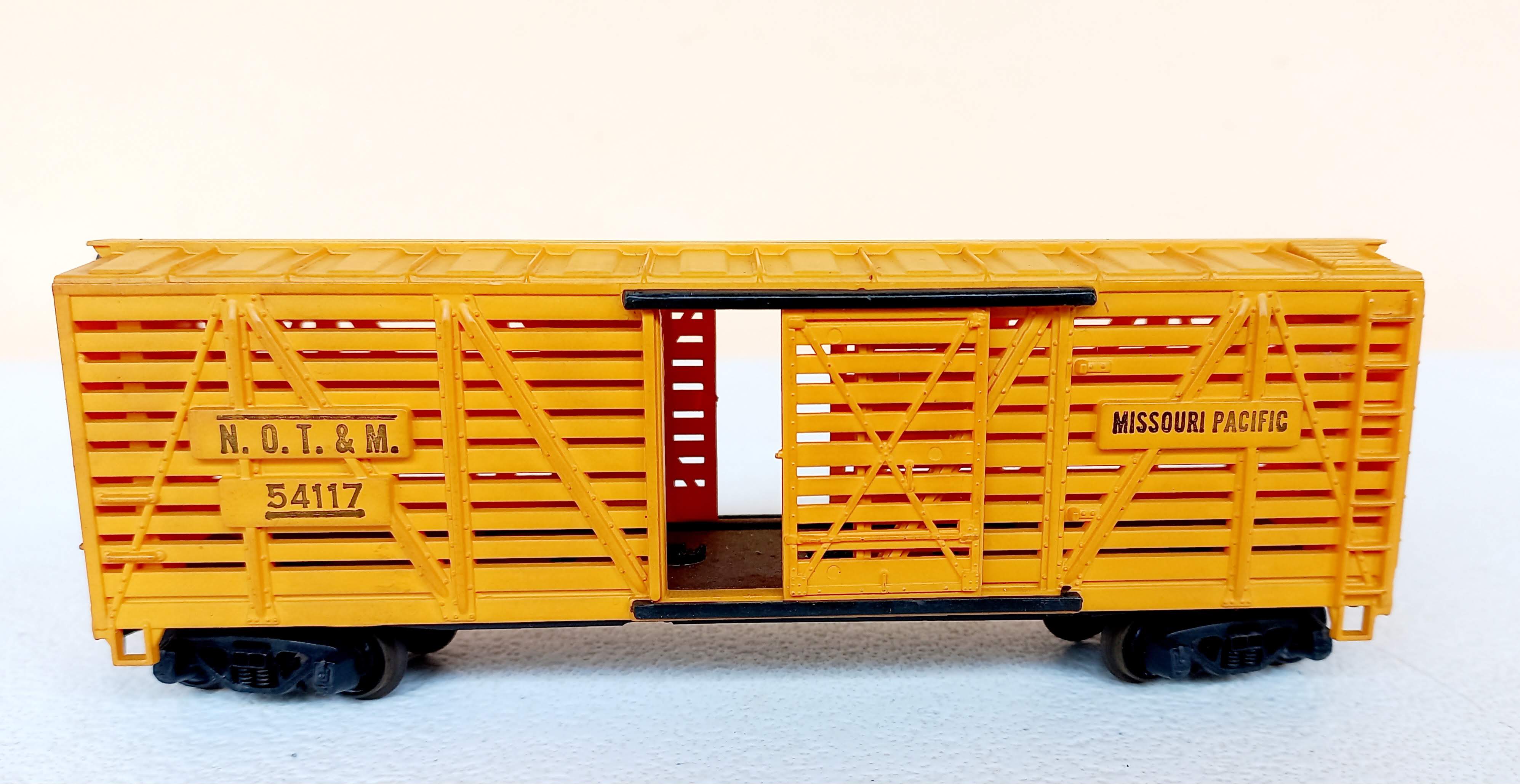 TYCO - Vagão de Gado N.O.T.& M. Missouri Pacific # 54117 (Amarelo)