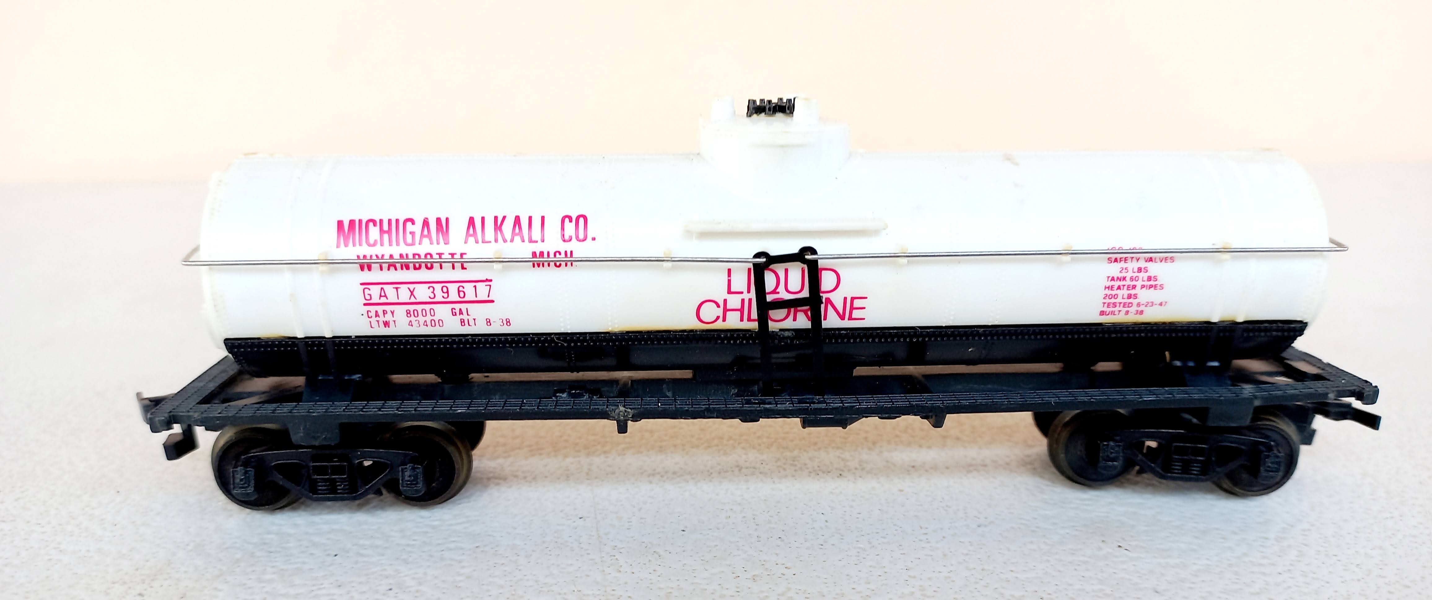 Vagão tanque 1  Domo Michigan Alkali co. #39617